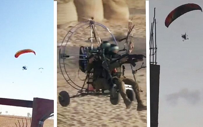 哈馬斯武裝人員乘動力滑翔傘滲透進以色列佔領區，並拍攝視頻。圖／觀察者網引自社群媒體
