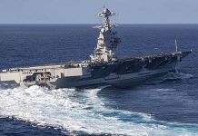 以色列「全面圍困」迦薩 美派機艦展示武力 「福特」號航母2019年10月29日在大西洋高速轉彎的畫面。(美國海軍)