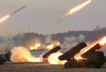 如果北韓也像哈瑪斯 上萬枚火箭彈狂射 韓國怎辦? 北韓進行火箭炮試射演習。(朝中社)