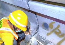 1月15日起清疏北市高架道路洩水孔 避免砂土阻塞 環保局維護民眾行車安全 圖/台北市政府提供