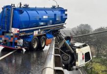 稀硫酸槽車「懸空」掛護欄 駕駛高架橋掉落當場殞命 圖/翻攝畫面、消防局提供