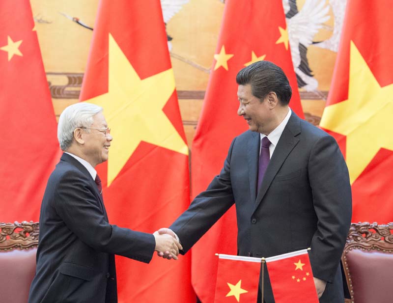圖為2015年越共中央總書記阮富仲訪問北京，與習近平舉行會談。圖／取自新華社