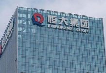 陸官媒一篇評論 中國房地產股集體飆漲 恆大集團曾是中國房地產龍頭,但近幾年爆發財務危機。圖/取自新華社