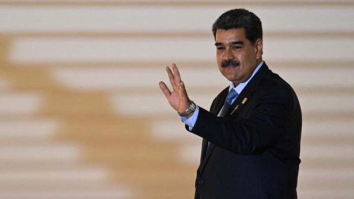 委內瑞拉總統馬杜羅訪中前，在國內受訪說，自己用的就是華為手機，並呼籲委國科學家學習大陸技術創新能力。圖／引自上觀新聞