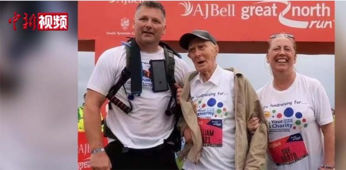 20230913512275 102歲的庫克西成為有史以來最年長的半馬完賽者。圖/翻攝自中新視頻