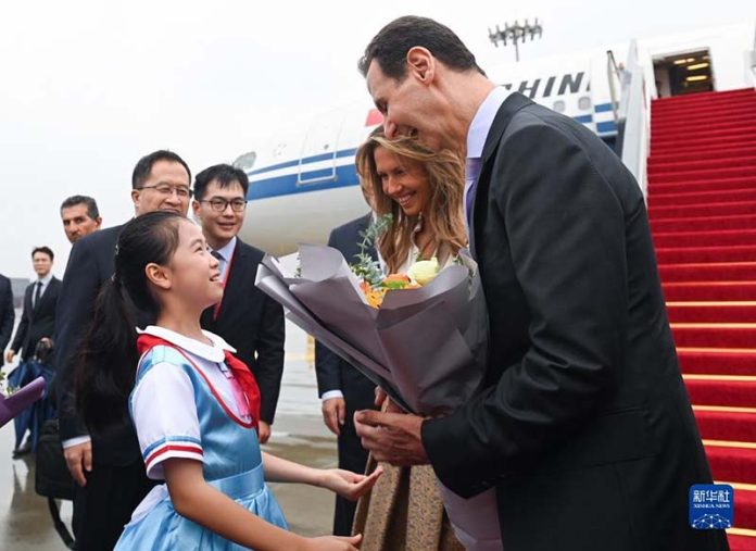 敘利亞總統巴沙爾21日中午抵達浙江杭州，準備出席亞運開幕式。圖／新華網
