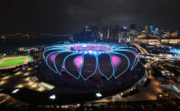 錢塘江畔的「大蓮花」杭州奥體中心體育場，5G訊號全覆蓋。圖／取自新華社