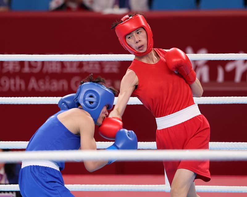 林郁婷(右)在女子拳擊57公斤級打進金牌戰。圖／中華奧會提供