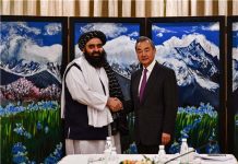 王毅會晤塔利班 盼阿富汗持續清剿東伊運 大陸外長王毅會晤阿富汗臨時政府代理外長穆塔基。圖/中國外交部官網