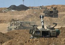 以巴不對稱戰爭 值得台灣借鏡 在加薩邊境以色列一側拍攝集結的以軍部隊。圖/新華社