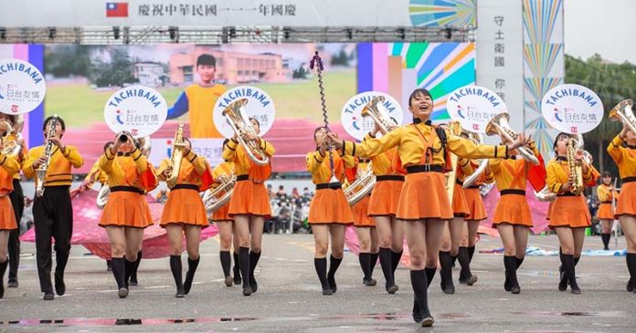 日本京都橘高校吹奏樂部去年來台參與國慶大獲好評，今年返台首發表演將在1210於高雄登場。圖／總統府